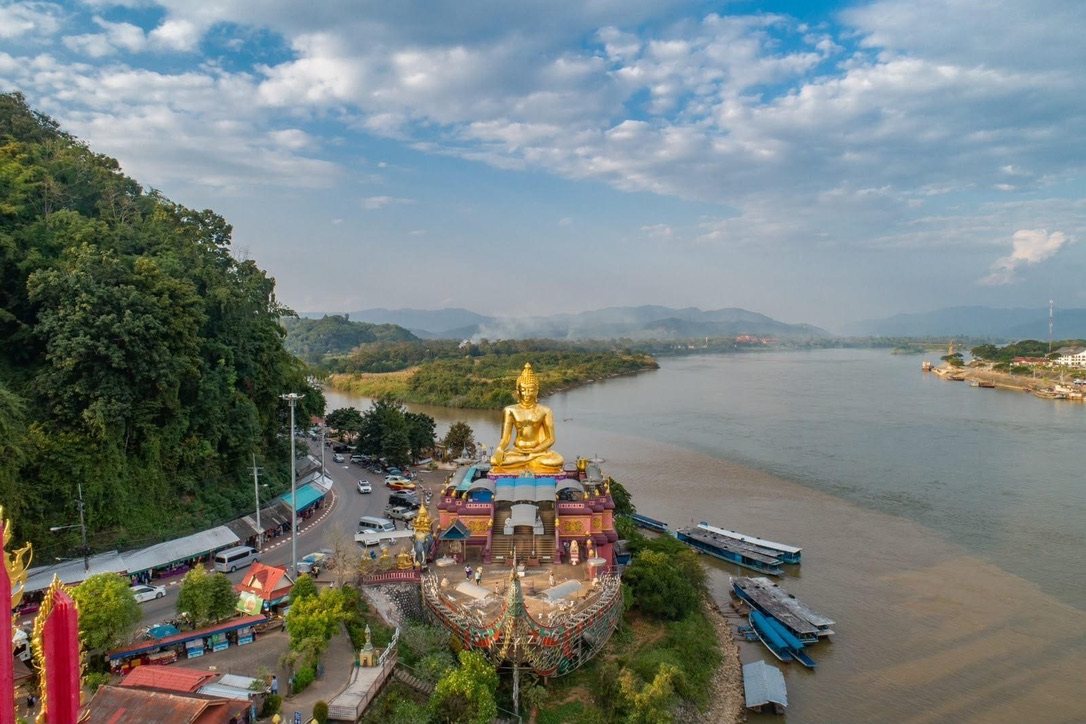 Golden Buddha beside the Mekong river from above